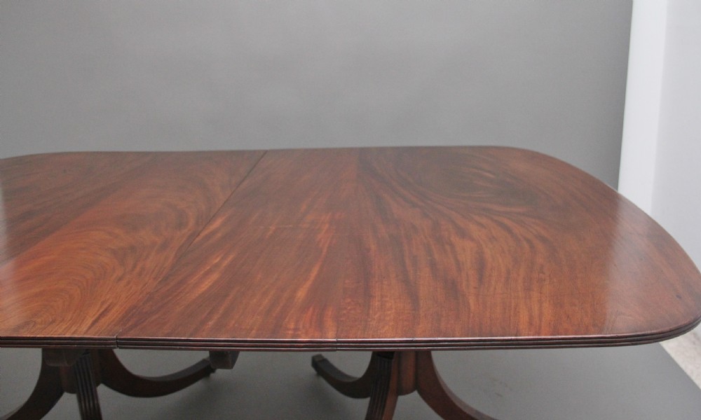 Wonderfully figured early 20th Century mahogany dining table View IV