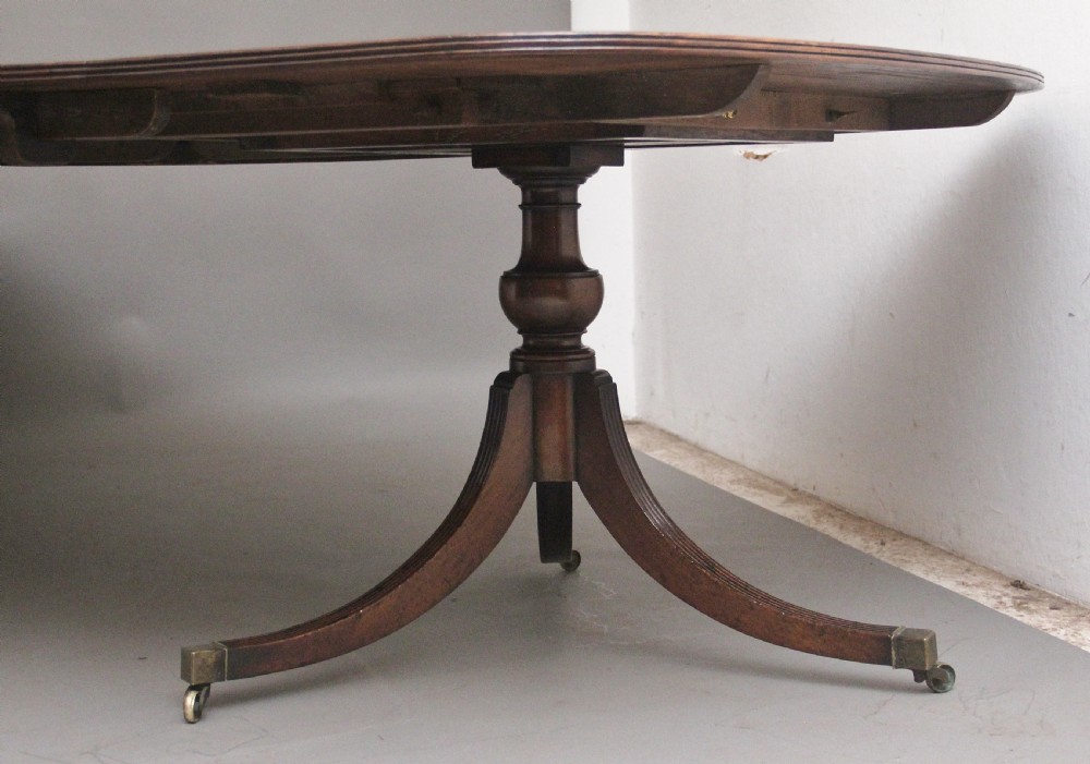 Wonderfully figured early 20th Century mahogany dining table View X