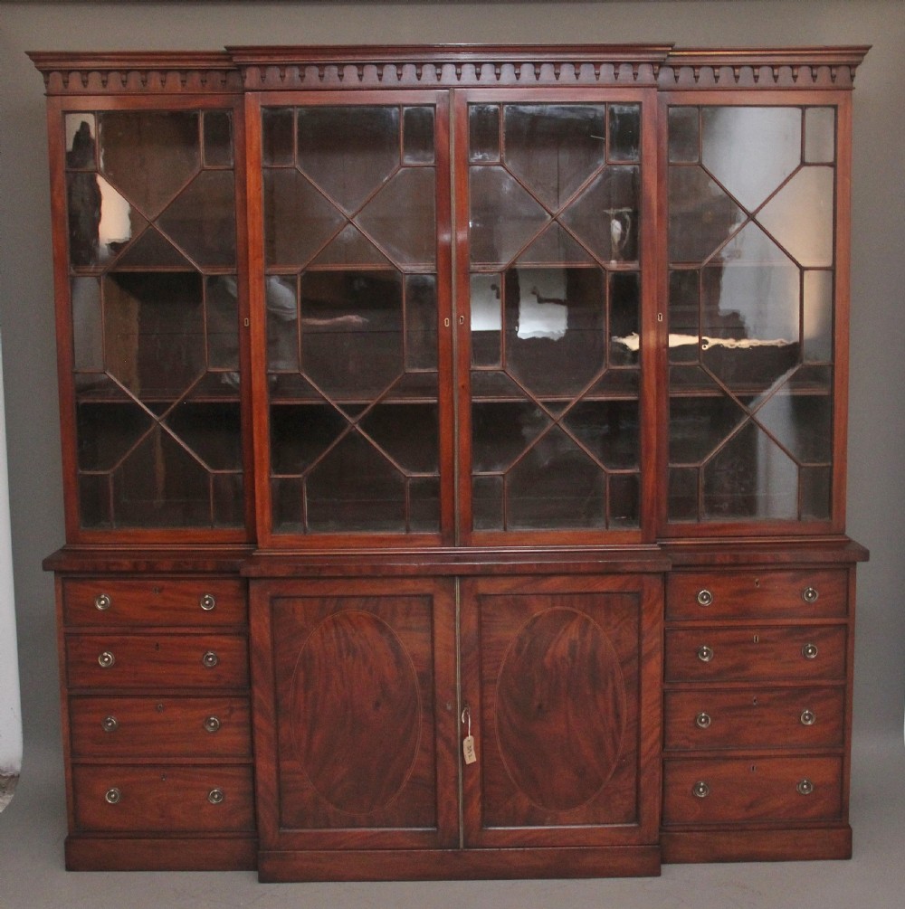 A superb quality early 19th Century mahogany breakfront bookcase