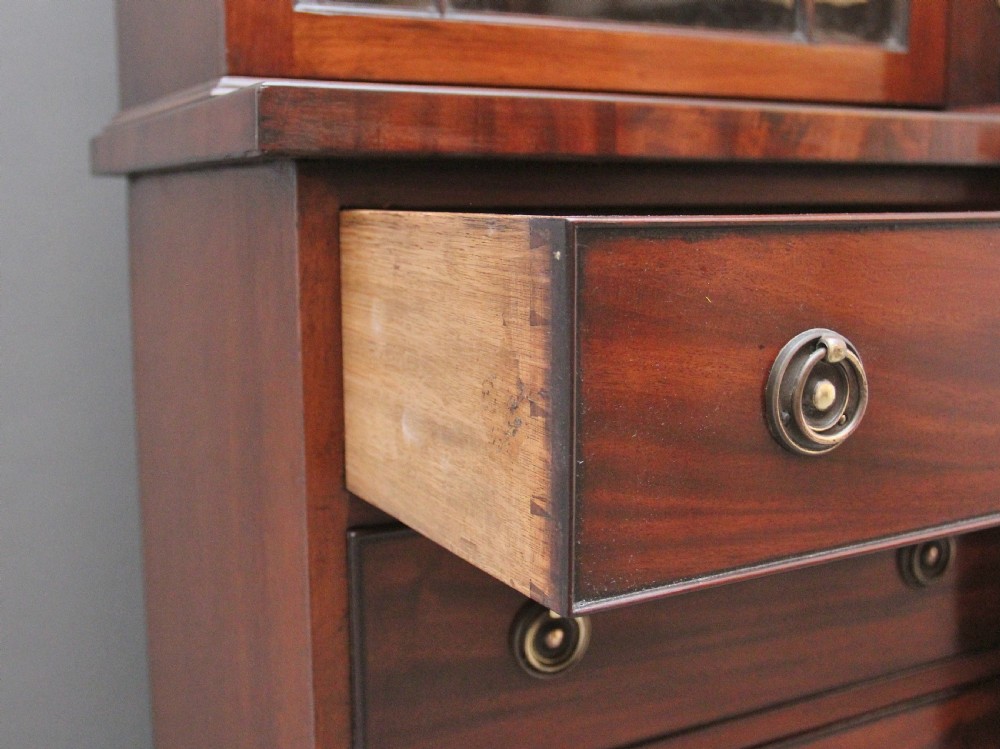 A superb quality early 19th Century mahogany breakfront bookcase View IX