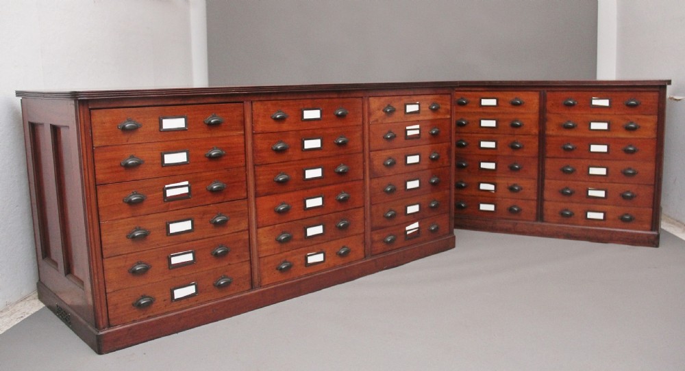 A pair of early 20th Century mahogany multi drawer chests