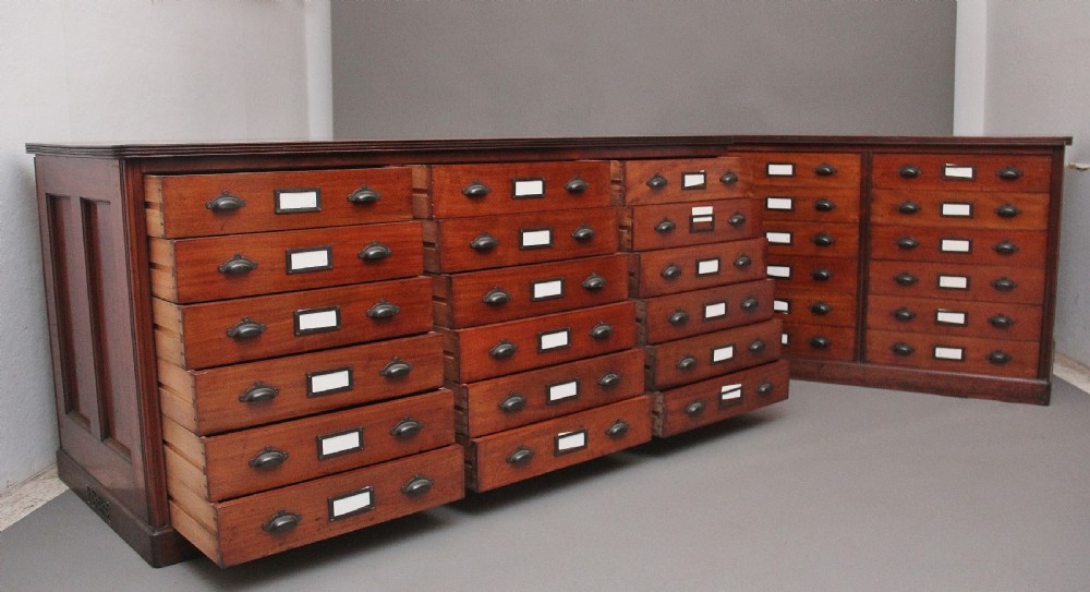 A pair of early 20th Century mahogany multi drawer chests View II