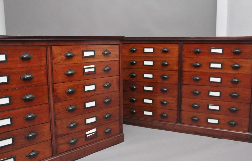 A pair of early 20th Century mahogany multi drawer chests View III