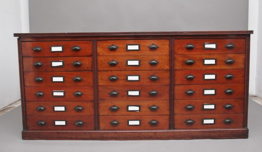 A pair of early 20th Century mahogany multi drawer chests View IV