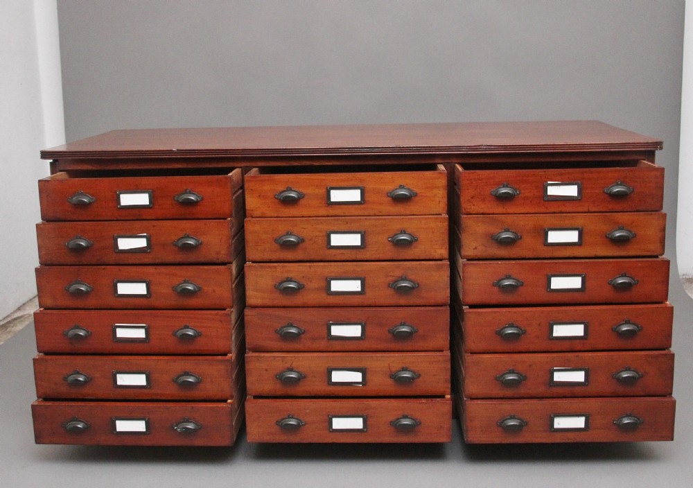 A pair of early 20th Century mahogany multi drawer chests View VII