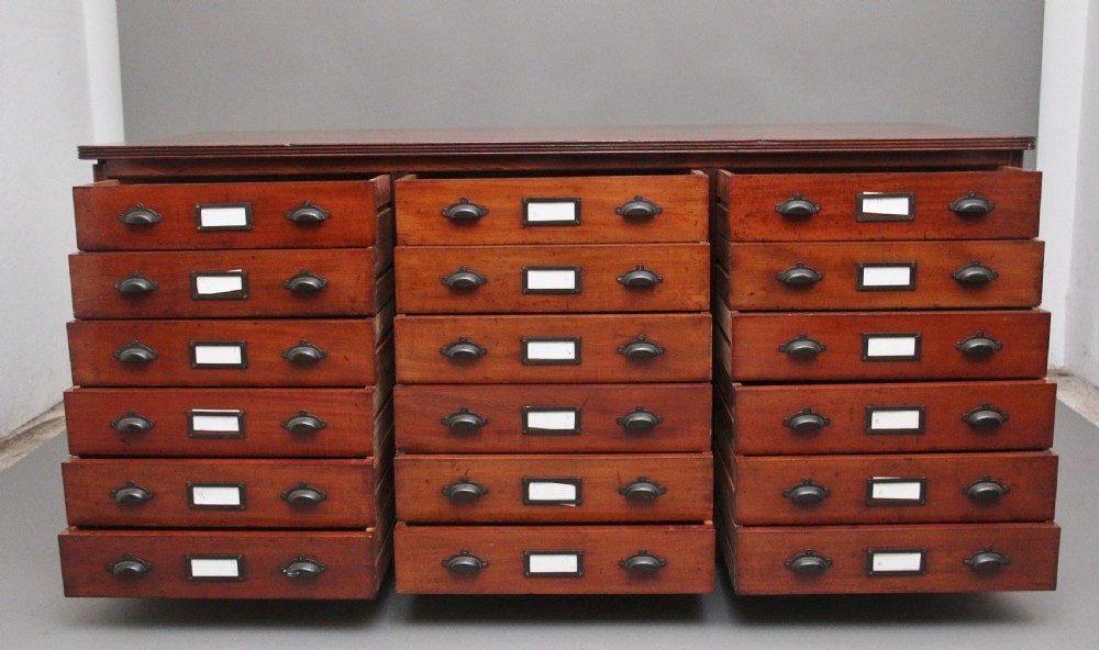 A pair of early 20th Century mahogany multi drawer chests View IX