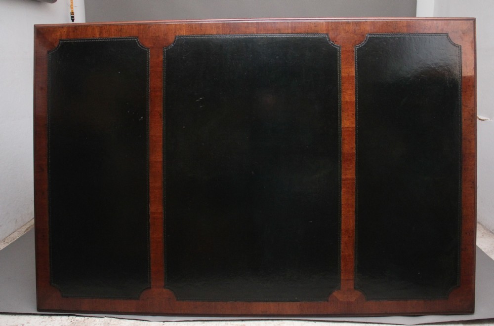 A large and impressive early 20th Century mahogany desk View IX