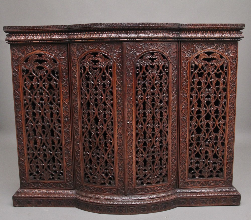 Mid 19th Century highly carved Anglo-Indian cabinet