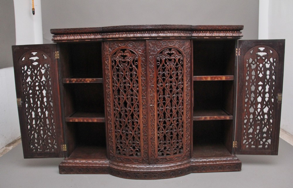 Mid 19th Century highly carved Anglo-Indian cabinet View II