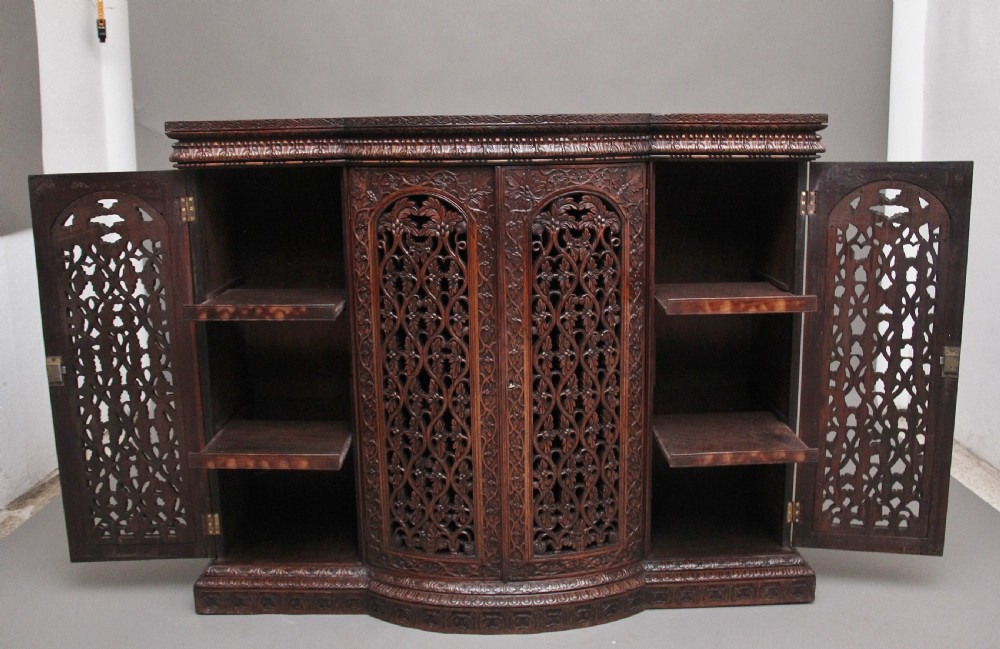 Mid 19th Century highly carved Anglo-Indian cabinet View III