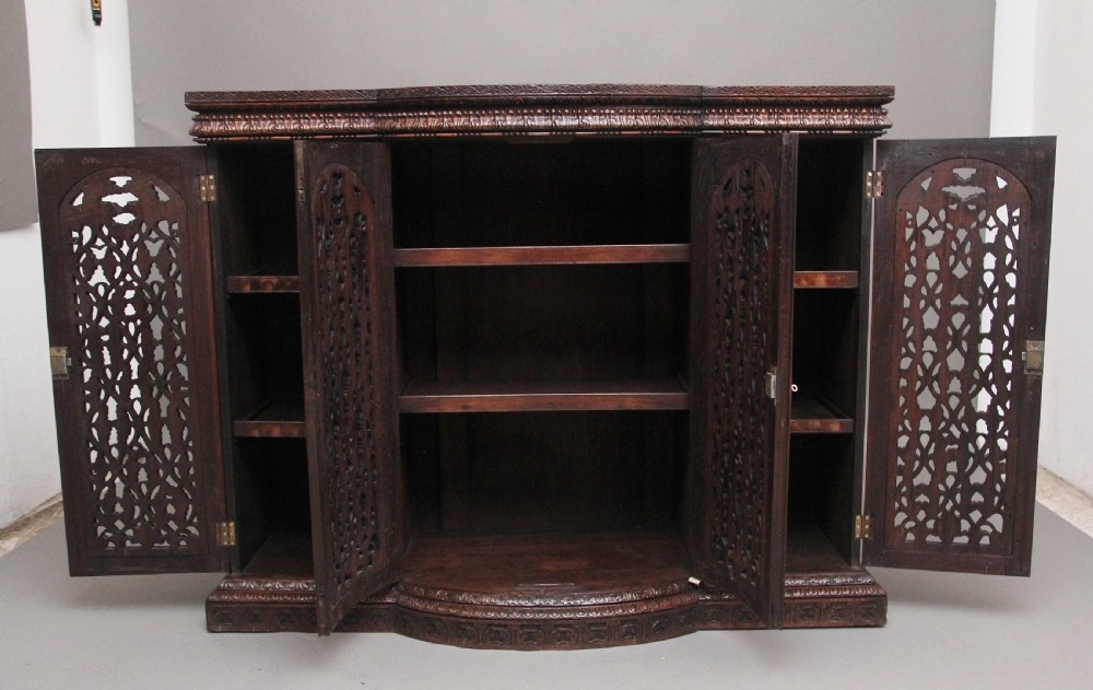 Mid 19th Century highly carved Anglo-Indian cabinet View IV