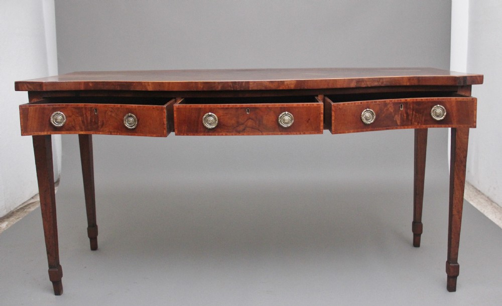 Quality early 19th Century mahogany serpentine serving table View II