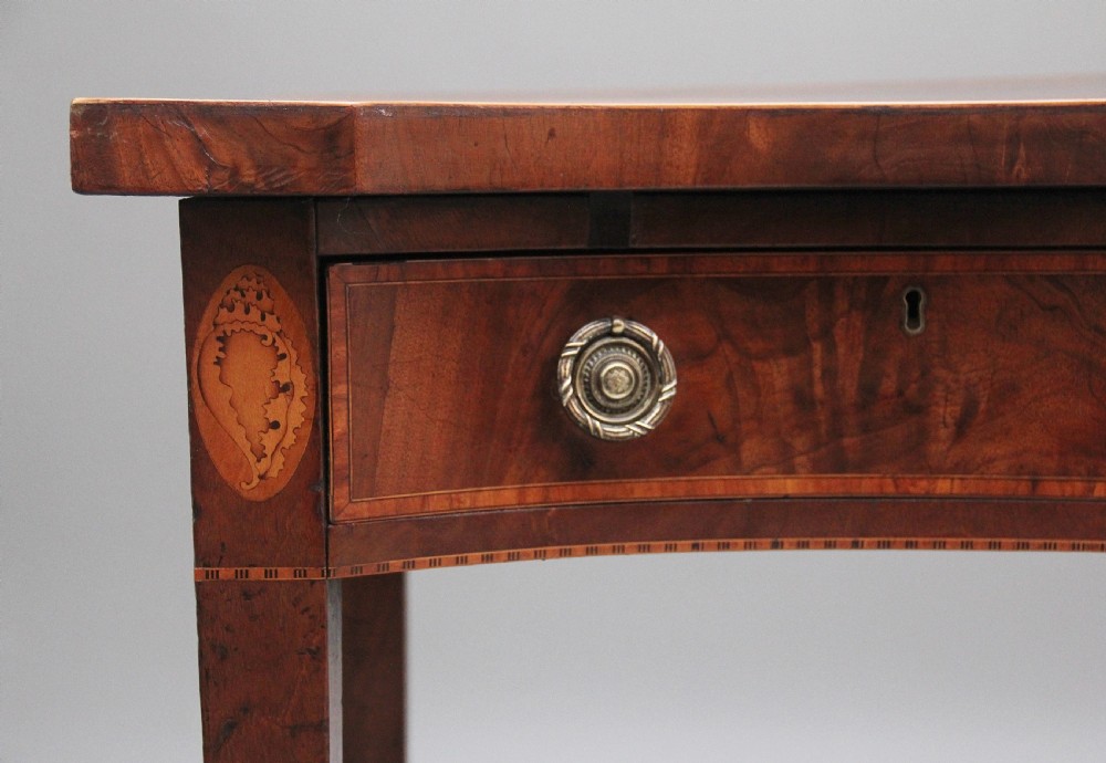Quality early 19th Century mahogany serpentine serving table View III