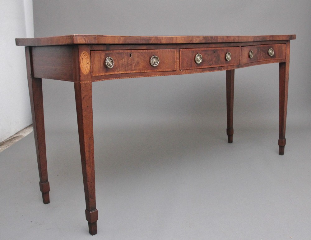 Quality early 19th Century mahogany serpentine serving table View IV