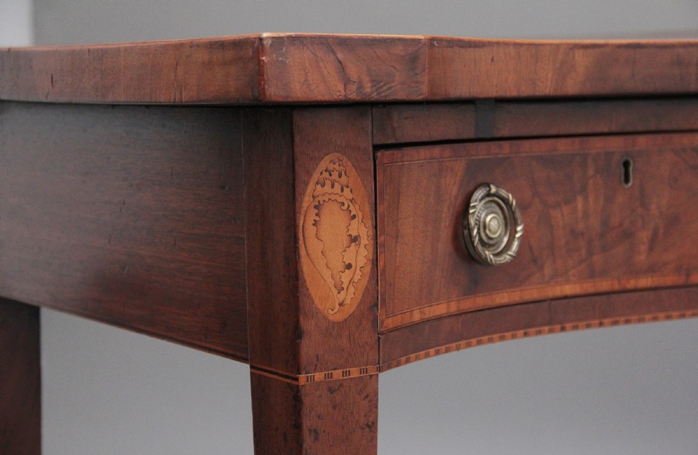 Quality early 19th Century mahogany serpentine serving table View V