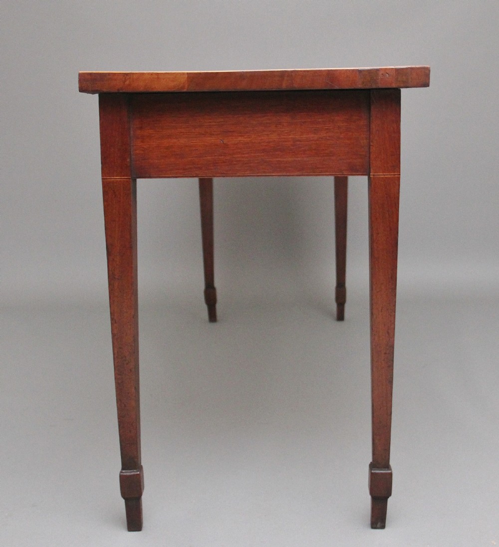 Quality early 19th Century mahogany serpentine serving table View IX