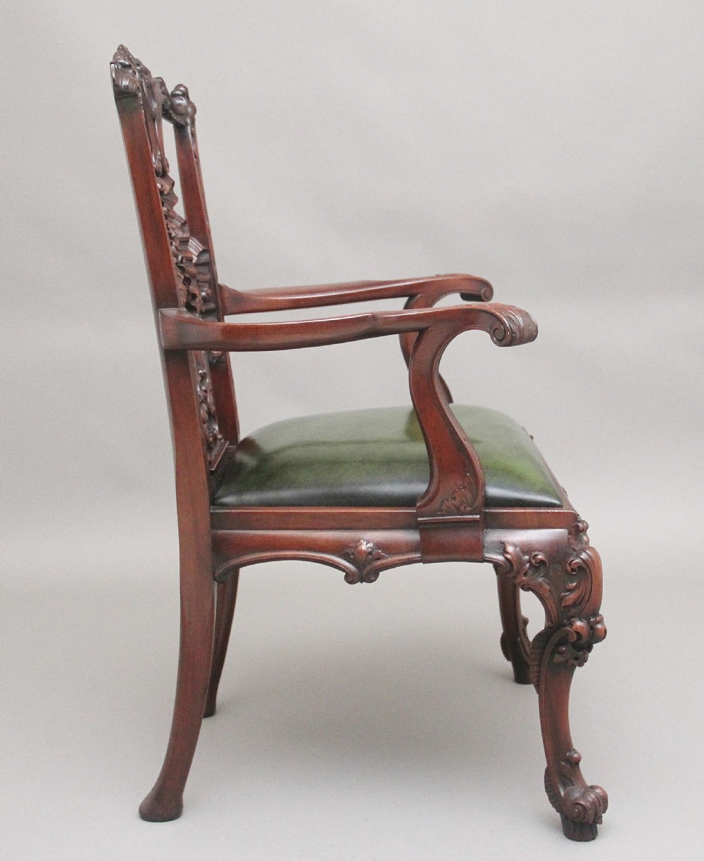A highly decorative early 20th Century carved mahogany armchair in the Chippendale style View II