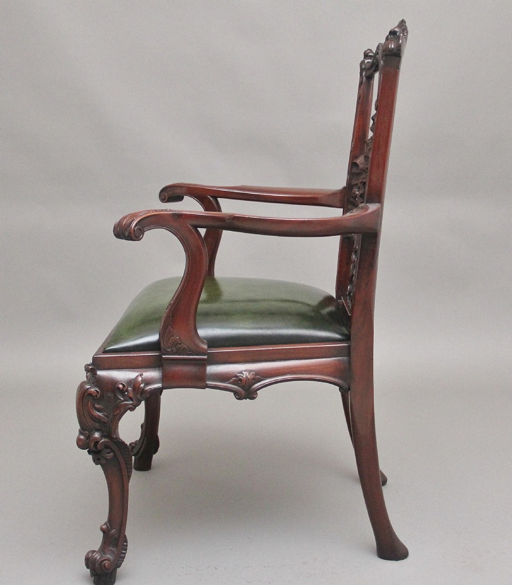 A highly decorative early 20th Century carved mahogany armchair in the Chippendale style View V