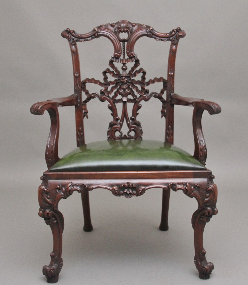 A highly decorative early 20th Century carved mahogany armchair in the Chippendale style View VI
