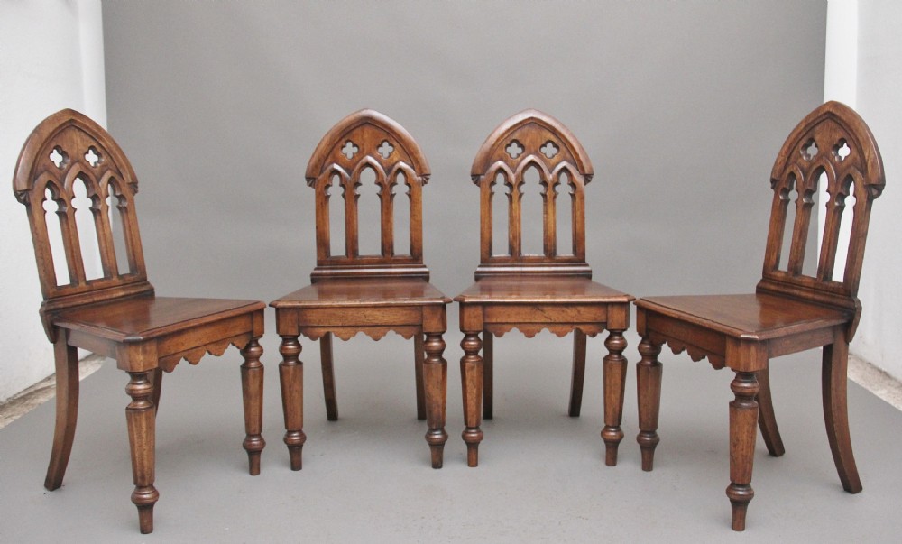Set of four early 20th Century Gothic style hall chairs View III