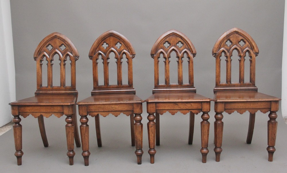 Set of four early 20th Century Gothic style hall chairs View IV