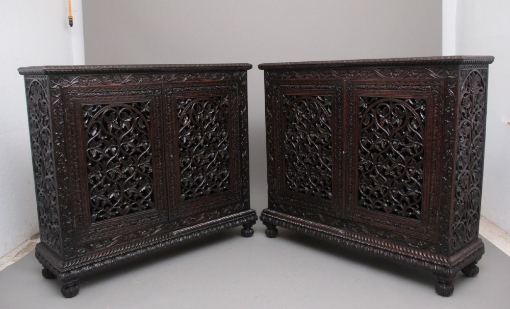Pair of antique 19th Century Anglo-Indian carved cabinets  View II