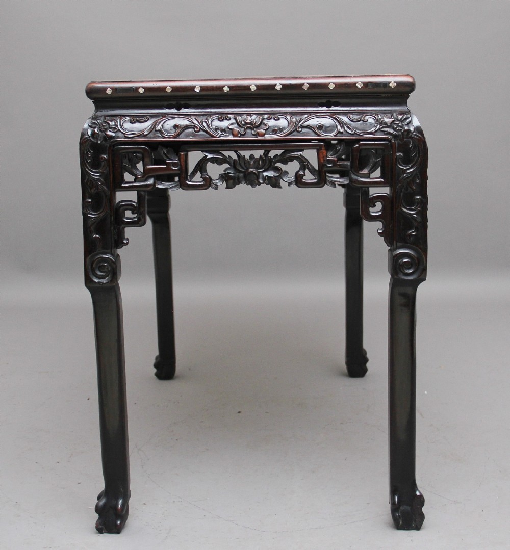 A dark carved hardwood Chinese centre table with an inset marble top and mother-of-pearl inlay along the frame. View III