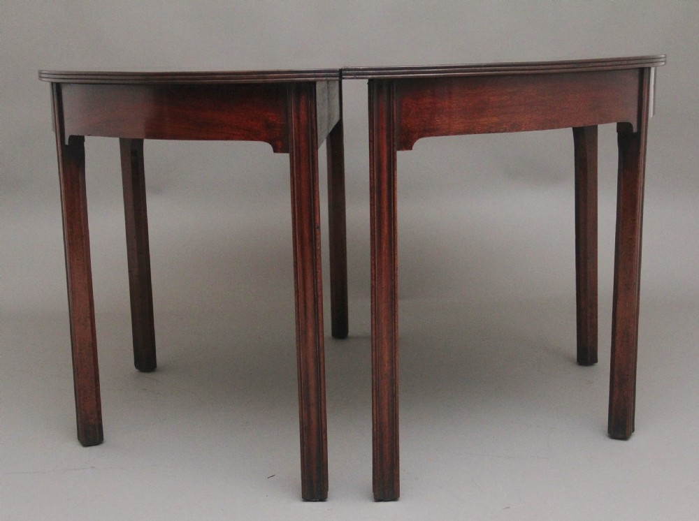 A fine pair of early 19th Century mahogany demi-lune console tables View III