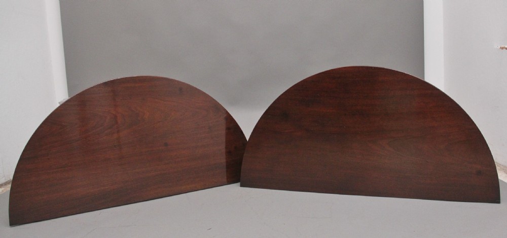 A fine pair of early 19th Century mahogany demi-lune console tables View V