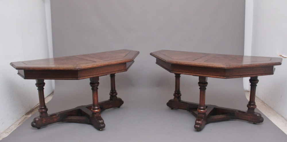 A pair of early 19th Century oak console tables