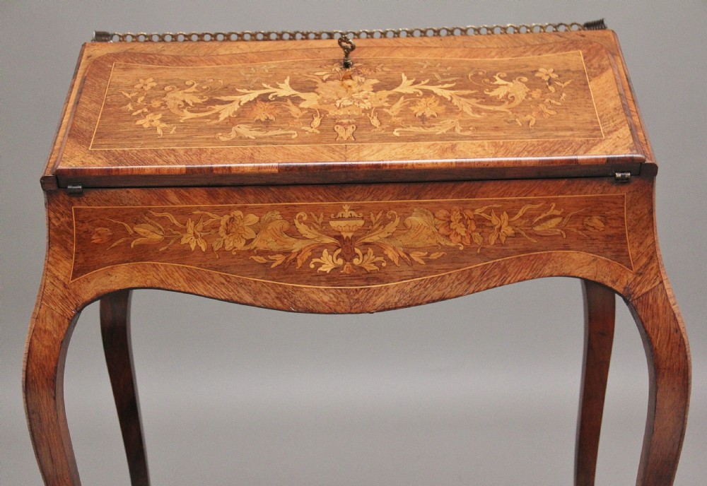 A superb quality freestanding 19th Century Kingwood and marquetry inlaid bureau View XII
