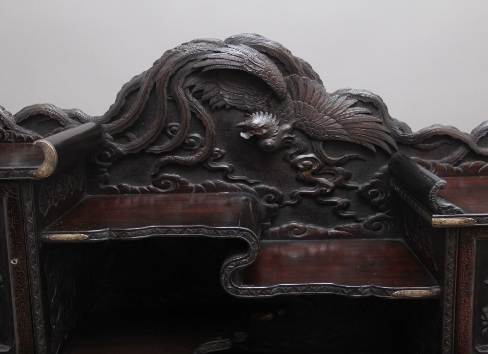 19th Century highly carved Japanese desk and chair View XIX