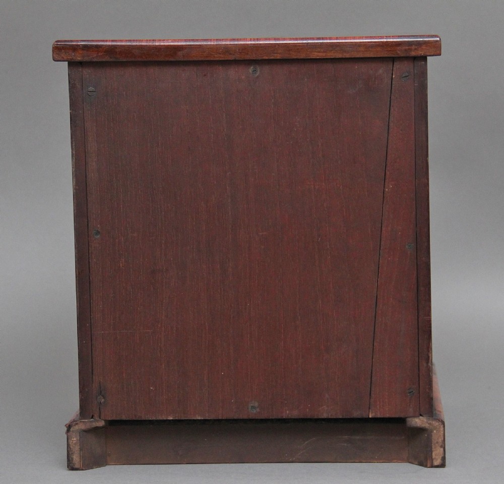 A 19th-century burr walnut tabletop cabinet with an open glazed door showing interior drawers with brass flush handles. View XI