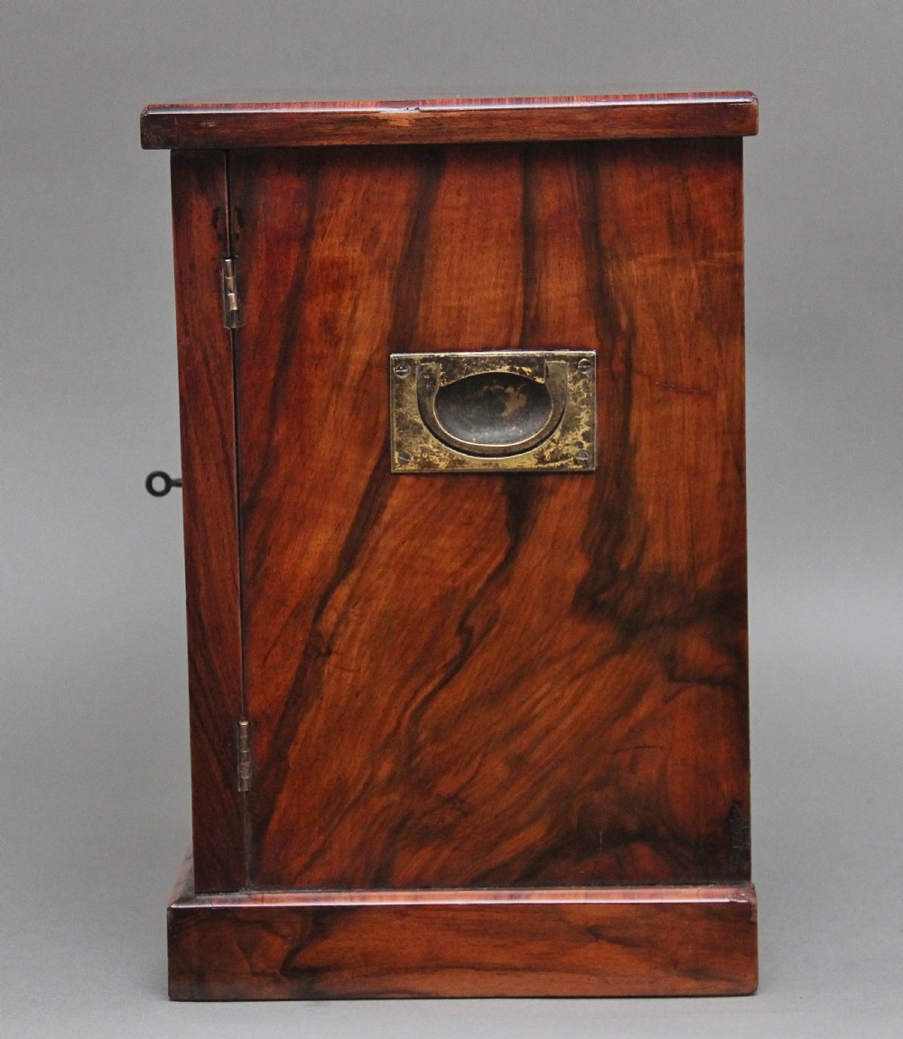 A 19th-century burr walnut tabletop cabinet with an open glazed door showing interior drawers with brass flush handles. View XII