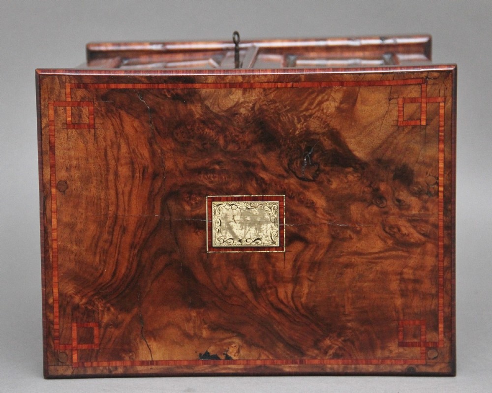 A 19th-century burr walnut tabletop cabinet with an open glazed door showing interior drawers with brass flush handles. View XIII