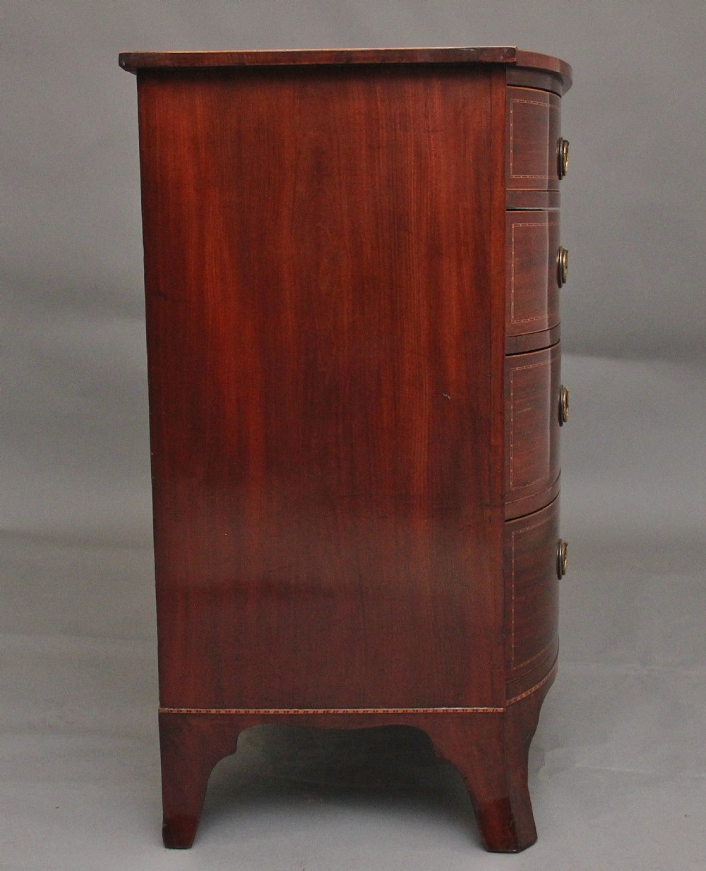 19th Century inlaid mahogany bowfront chest of drawers View IV