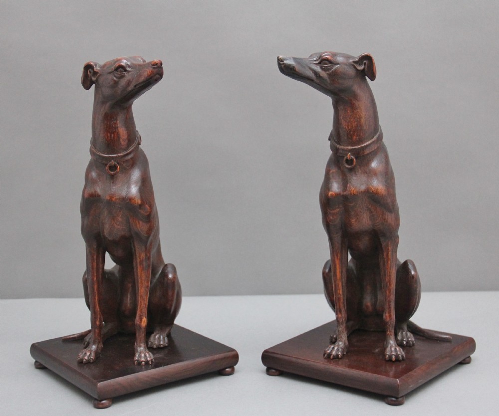 Pair early 20th Century carved oak greyhounds