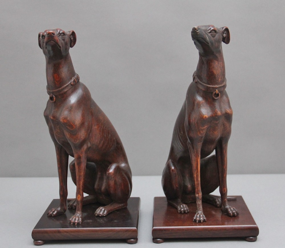 Pair early 20th Century carved oak greyhounds View II