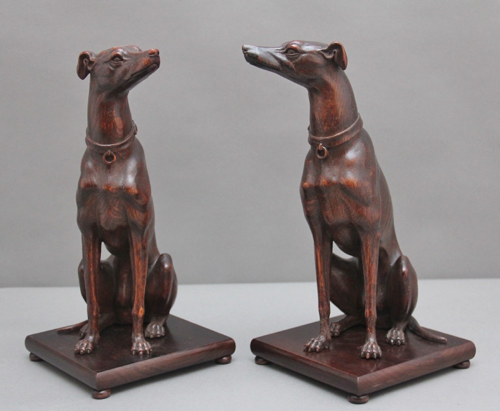 Pair early 20th Century carved oak greyhounds View III