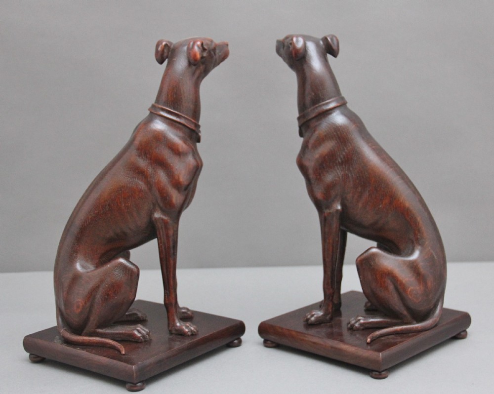 Pair early 20th Century carved oak greyhounds View V