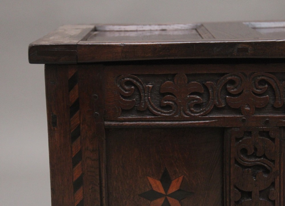 18th Century carved and inlaid oak coffer View III