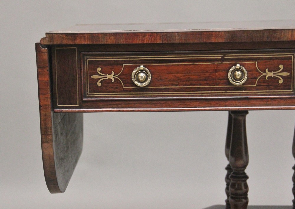 Regency rosewood and brass inlaid sofa table View III