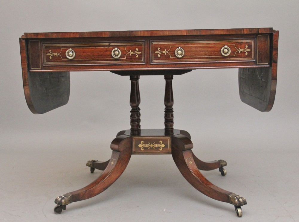 Regency rosewood and brass inlaid sofa table View IV