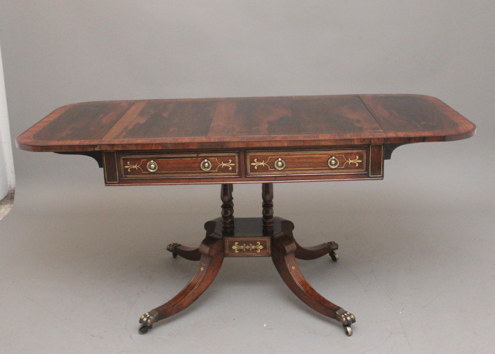 Regency rosewood and brass inlaid sofa table View VI