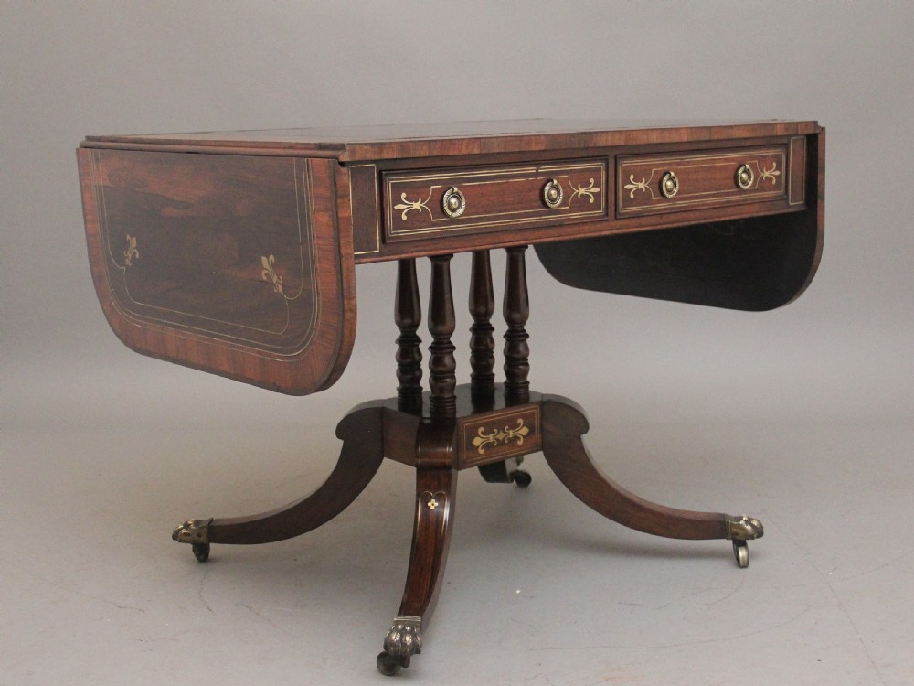 Regency rosewood and brass inlaid sofa table View VIII