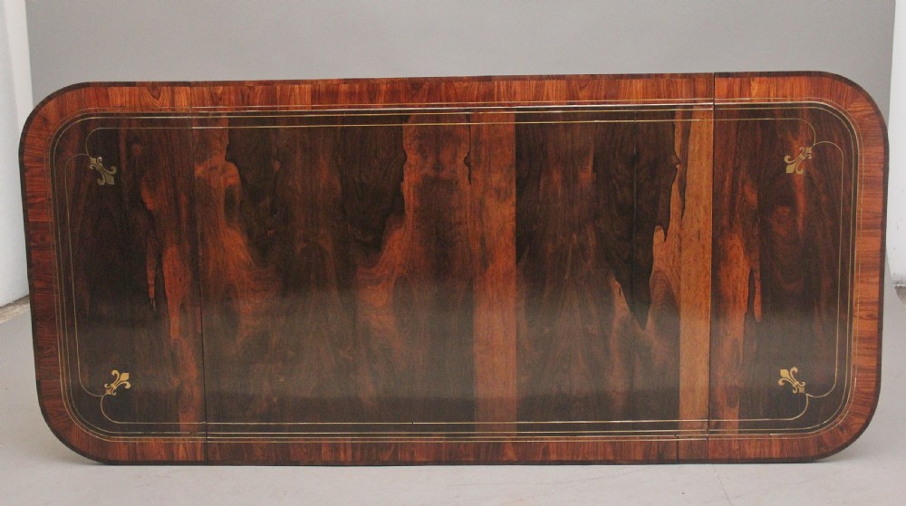 Regency rosewood and brass inlaid sofa table View XIII