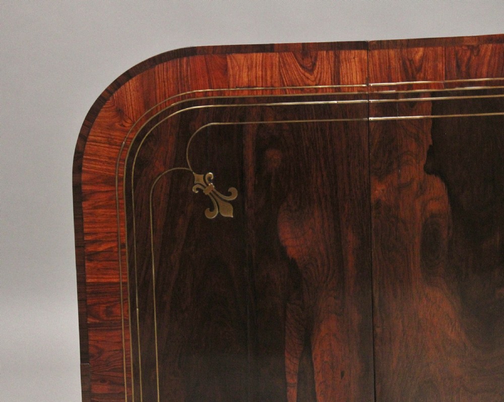 Regency rosewood and brass inlaid sofa table View XIV