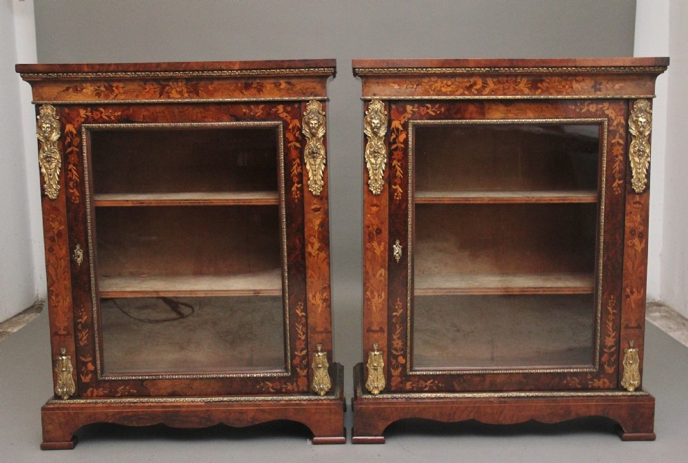 Pair of 19th Century walnut pier cabinets by Edwards & Roberts View II