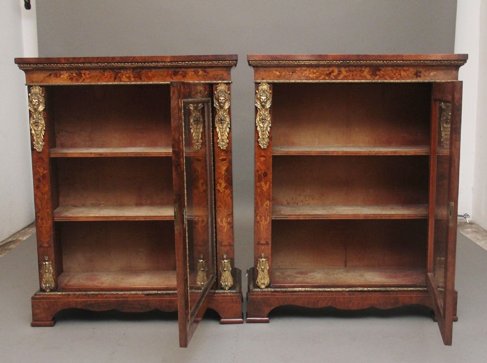 Pair of 19th Century walnut pier cabinets by Edwards & Roberts View III