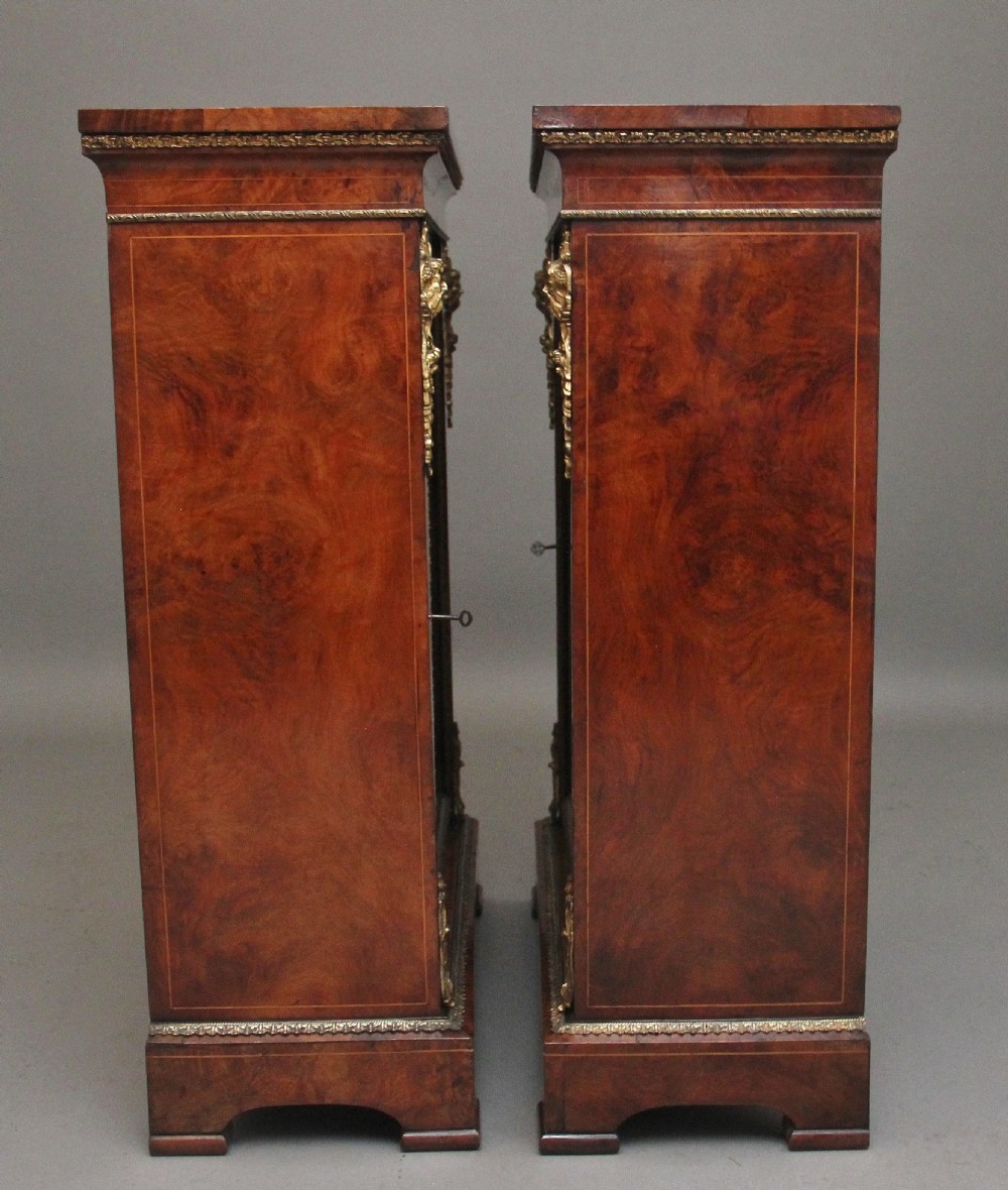 Pair of 19th Century walnut pier cabinets by Edwards & Roberts View V